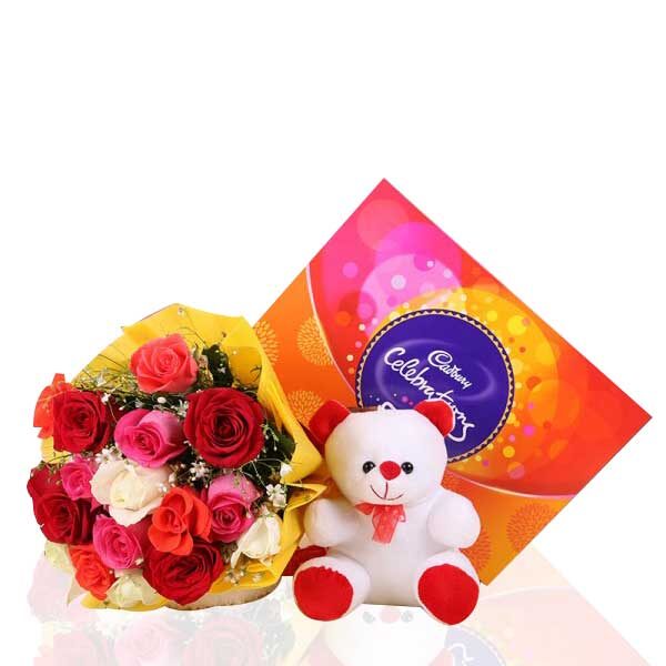 12 Assorted Roses with a cute Teddy Bear and a pack of Cadbury's Celebrations