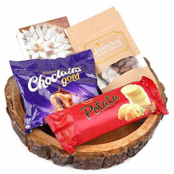 Log Platter of Kaju Katli, Chocolate Coated Almonds, Chocolairs and Potata Biscuits